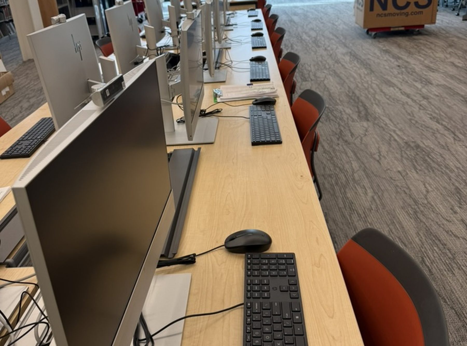Computer workstations relocated and reconnected by NCS in a campus library