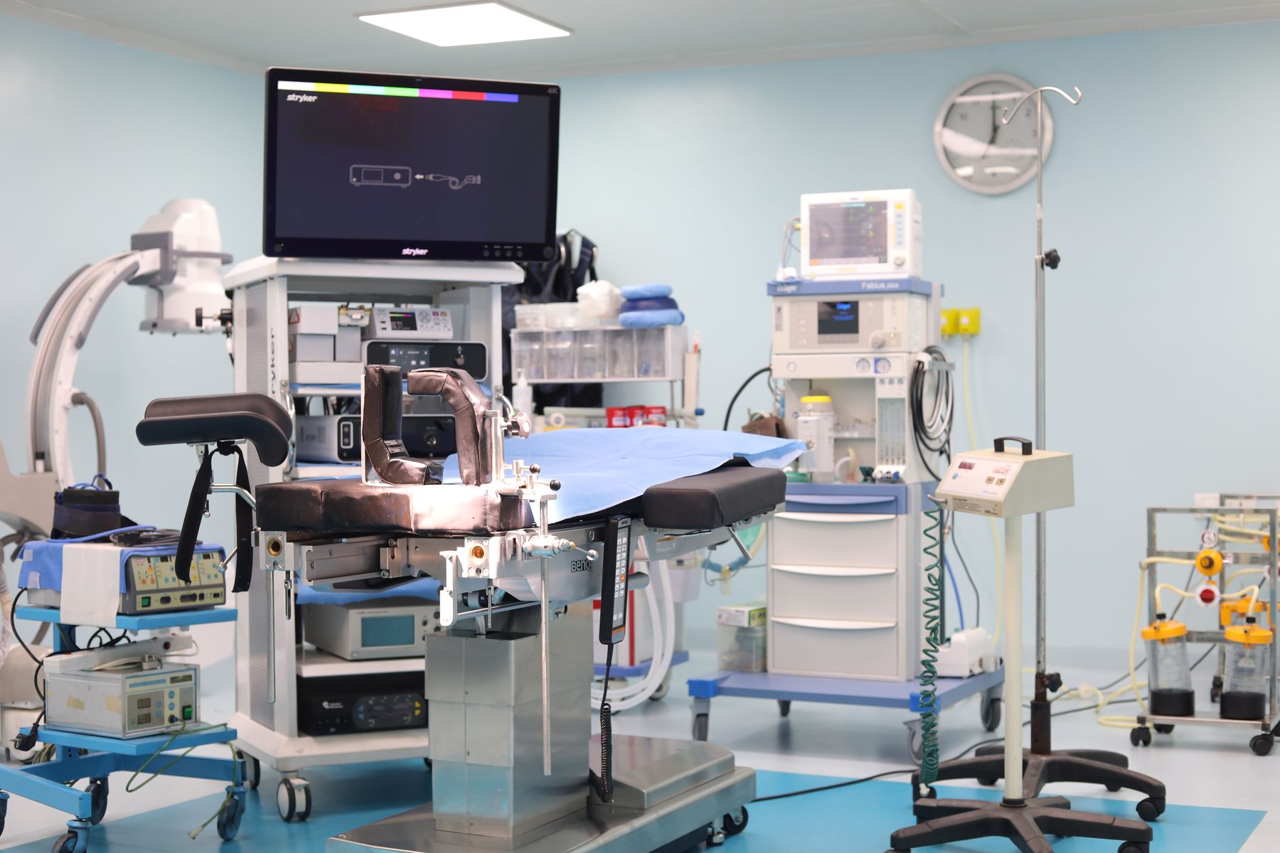 Operating room with surgical table and medical equipment